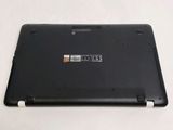 a black laptop with a sticker on the back of it