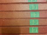 a picture of a stack of books on a shelf