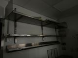 a metal shelf that has some shelves on it