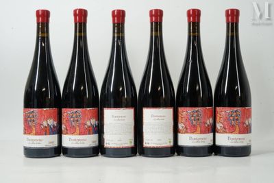 six bottles of red wine are lined up on a table