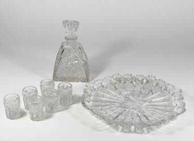 a lot of glass items that are sitting on a table