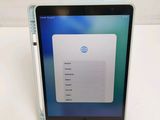 an image of a tablet computer sitting on top of a white table