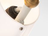 a close up of a lamp that is on a table