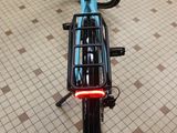 a bicycle that is sitting on the floor in the room