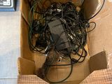 a cardboard box with a bunch of wires inside of it