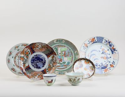 many different types of plates and bowls on the table