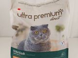 a close up of a bag of cat food on a table