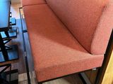a couch and a table in the corner of a room