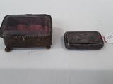 pair of antique silverware boxes with red glass in them