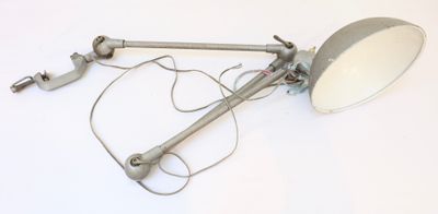 a lamp that is sitting on a white surface