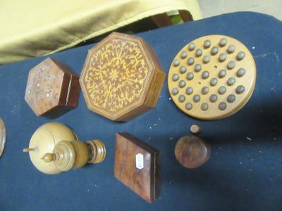 a lot of wooden objects on a blue table