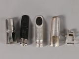 several different types of tools are lined up on a white surface