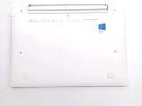 a white laptop computer sitting on top of a white table