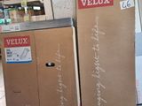 two boxes sitting on the floor next to each other