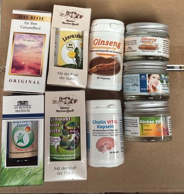 a lot of different types of canned food in a box