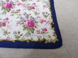 a picture of a blue and white floral table runner