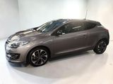 a grey car is parked in a white room