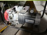 a small engine that is sitting on a stand