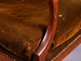 a brown chair with a brown seat and a brown cushion