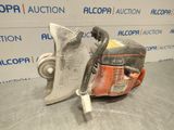 a close up of a chainsaw sitting on top of a table