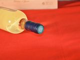 a bottle of wine that is sitting on a table