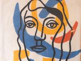 une peinture représentant le visage d'une femme sur un mur