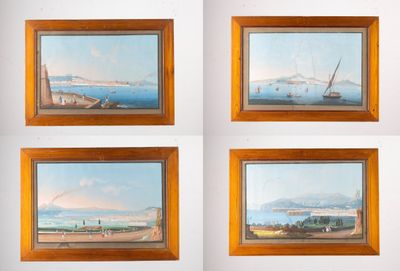 four framed paintings of boats on the water in a wooden frame