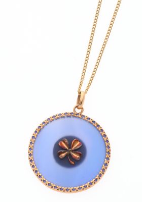 a close up of a necklace on a white background