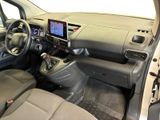 the interior of a car with a steering wheel, dashboard, and dashboard controls