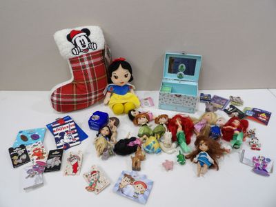 a pile of toys and a stuffed animal on a table