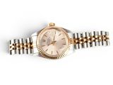 an image of a lady ' s rolex watch on a white background