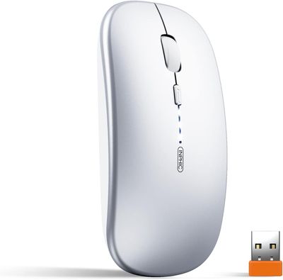 a computer mouse that is sitting next to a usb drive