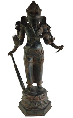 bronze statue of a woman holding a sword and a shield
