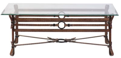 an image of a glass top coffee table with a metal frame and glass top