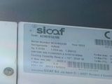 a close up of a piece of paper with a sticker on it