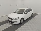 a picture of a white car parked in a garage