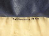 an image of a black and yellow jacket with a name on it