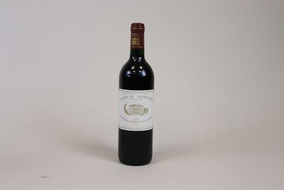 a bottle of wine that is sitting on a table