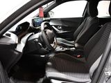 the interior of a car with black leather seats and a steering wheel