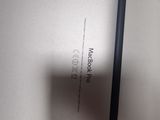 a close up of the back of an ipad with the screen partially open