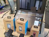 a display of various electronic devices on a table