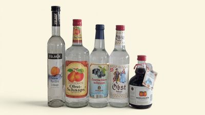 many different types of alcohol bottles on the table