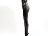bronze statue of a woman holding a flower in her right hand