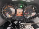 a close up of a speedometer and gauges on a motorcycle