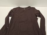 the long sleeved shirt is brown and has long sleeves