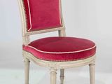 an image of a chair with a red upholstered seat on a white background