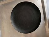 a frying pan sitting on top of a stove