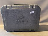a gray case that is sitting on a table
