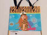a bag that has a picture of a woman on it
