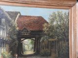 a painting of a woman sitting on a bench in front of a building